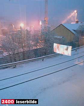 HVITT I HARSTAD: Det er nesten julestemning i Harstad, mener Bj�rnar Trondsen.