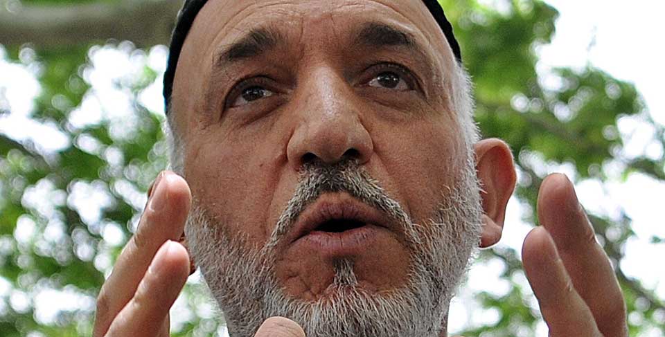 BOIKOTTER: Hamid Karzai har boikottet USAs fors�k p� � rydde opp i narkotikaproblemene i landet, mener en tidligere toppdiplomat.