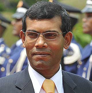NY PRESIDENT: Etter 30 �r fikk Maldivene i dag sin f�rste demokratisk valgte president. 41 �r gamle Mohamed Nasheed vurderer � kj�pe nytt land.