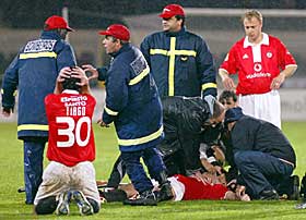Miklos Feher dying on the field despite prompt medical care. Crying and praying team mates around